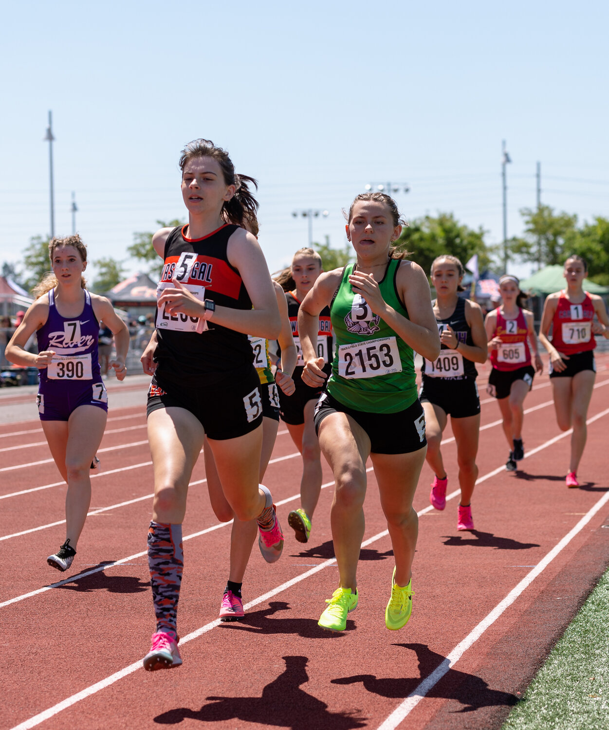 Tumwater’s Annabelle Clapp chases Washougal’s Sydnee Boothby down the back straight in the 2A girls 800 prelims at the WIAA 2A/3A/4A State Track and Field Championships on Friday, May 26, 2023, at Mount Tahoma High School in Tacoma. (Joshua Hart/For The Chronicle)